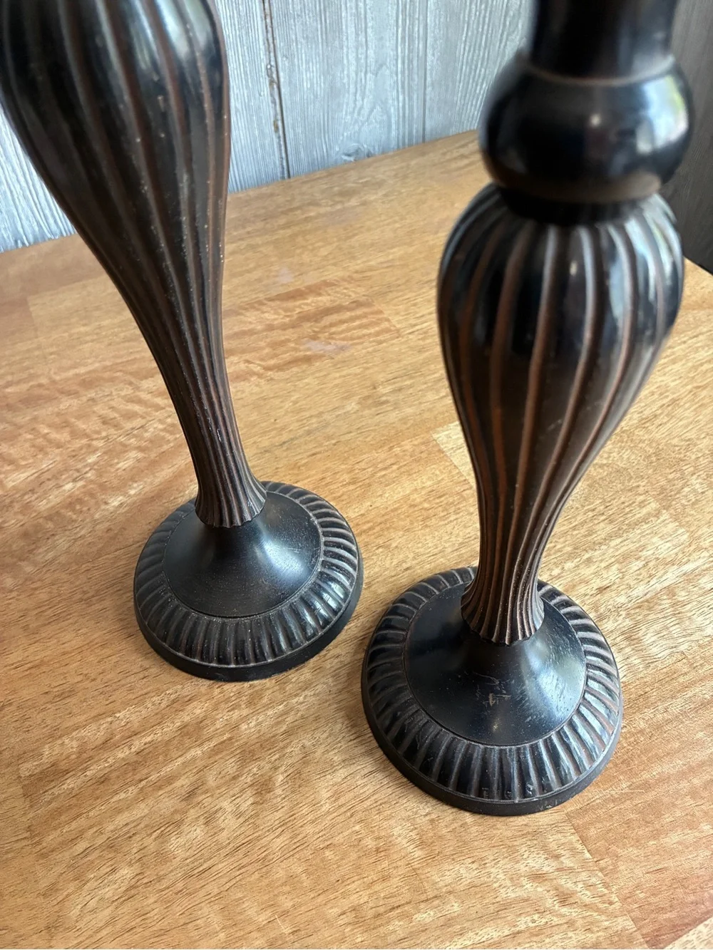 Vintage like Black Metal Candlesticks with Red Ribbed Taper Candles. Very heavy